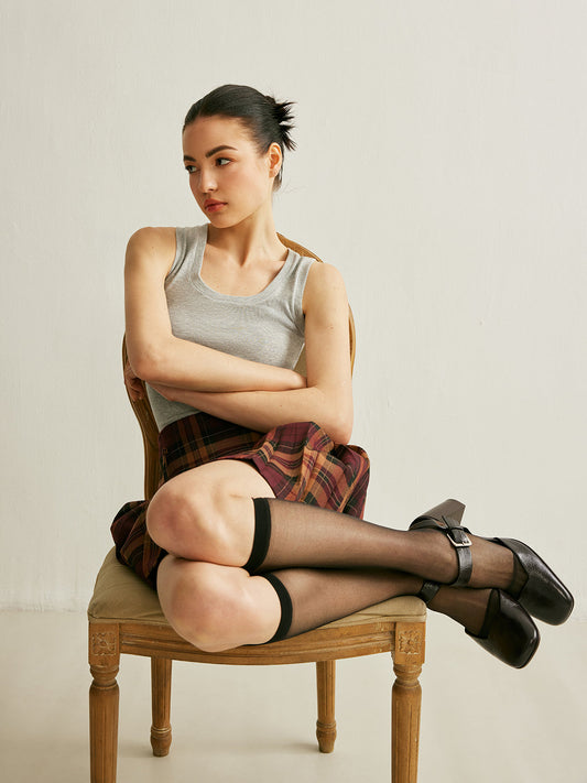 Çarpıcı Bir Görünüm İçin Sensasyonel Siyah File Diz Üstü Çoraplar