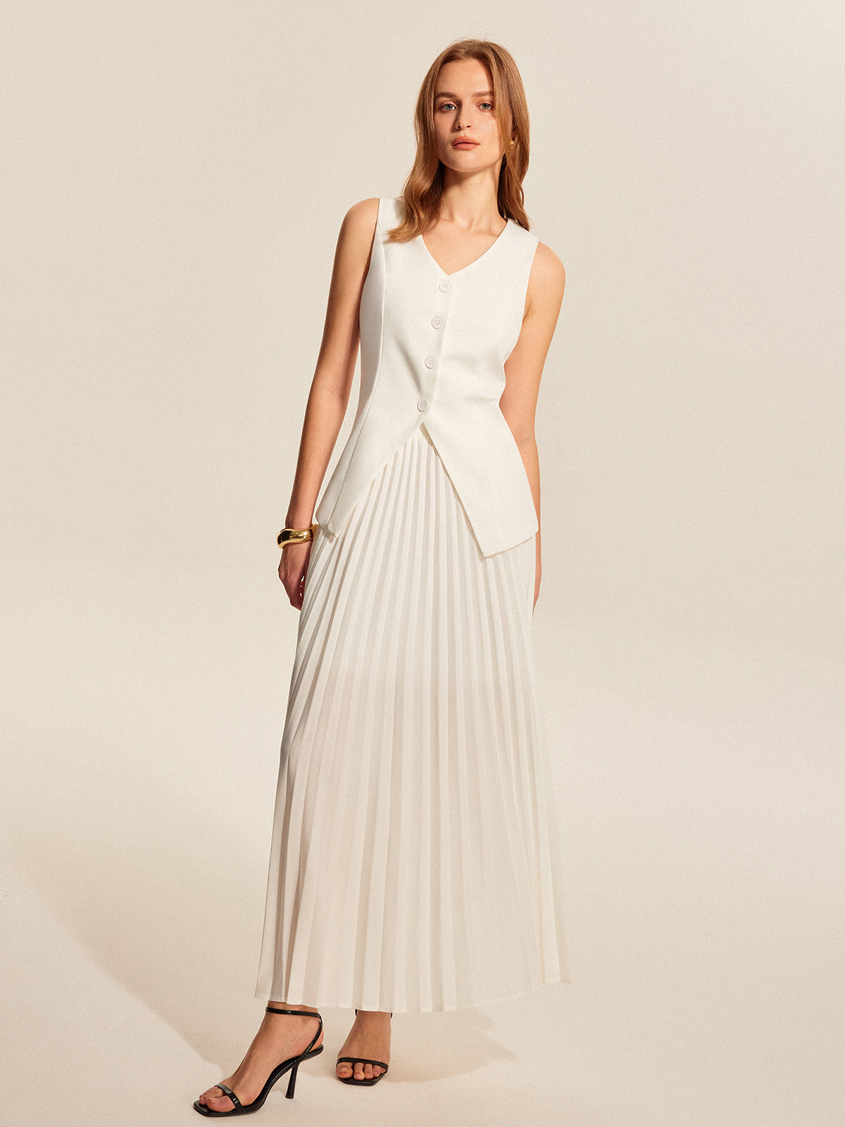 Şık Düğümlü Yelek ve Akışkan Pliseli Etek Takımı